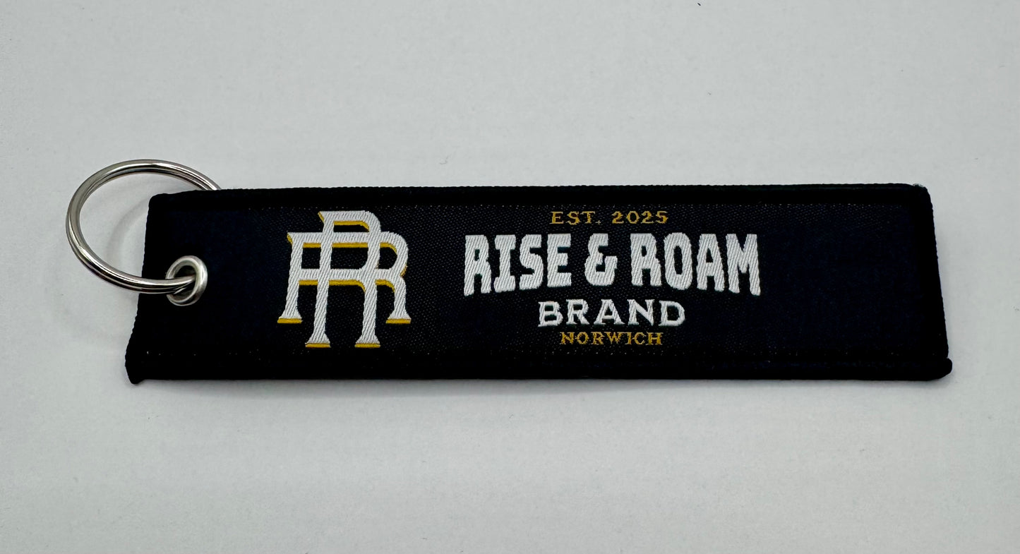 Rise & Roam Brand - Remove Before Flight Keyring.