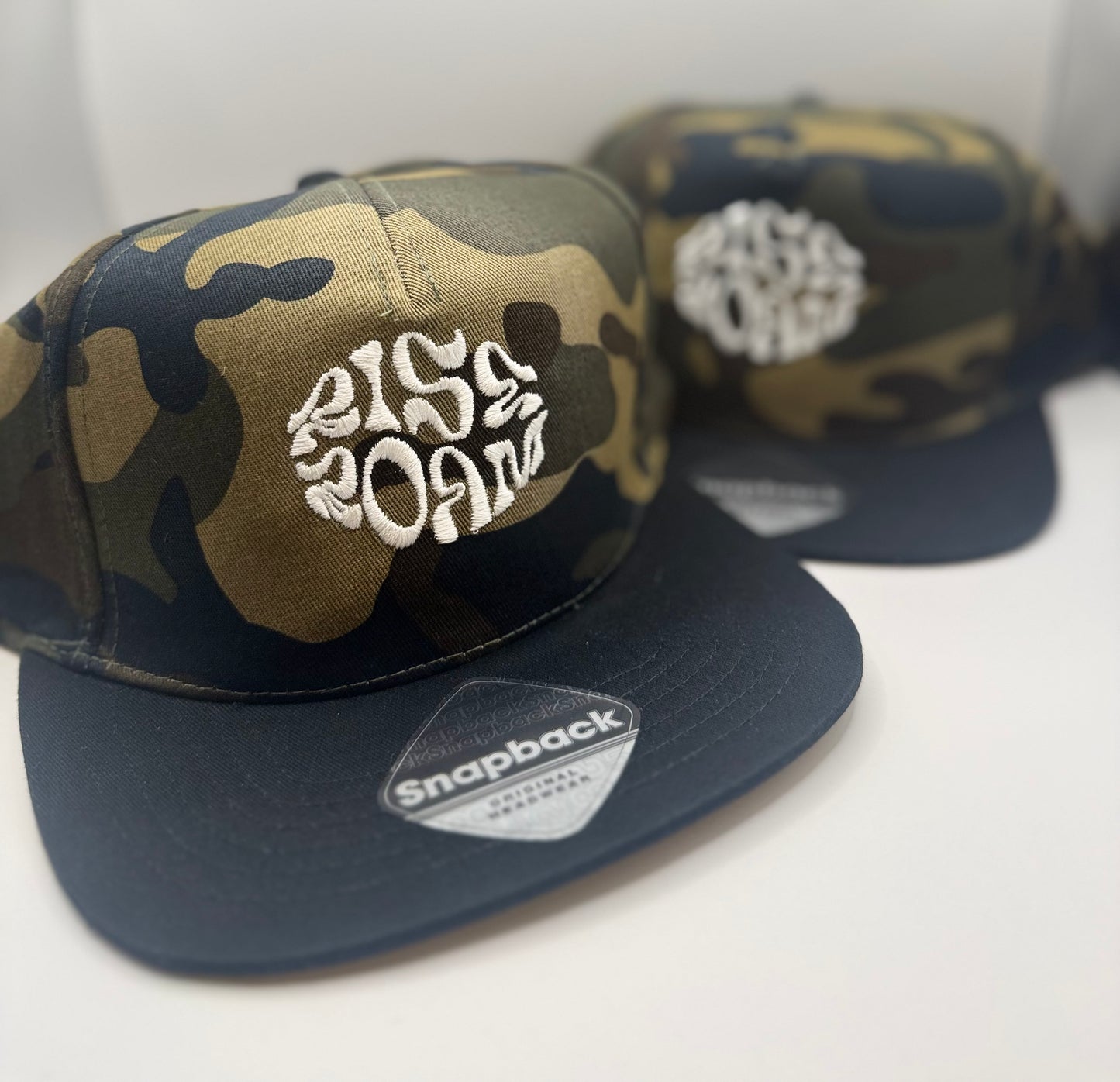 Rise & Roam Brand - Camo Squiggle SnapBack Cap.
