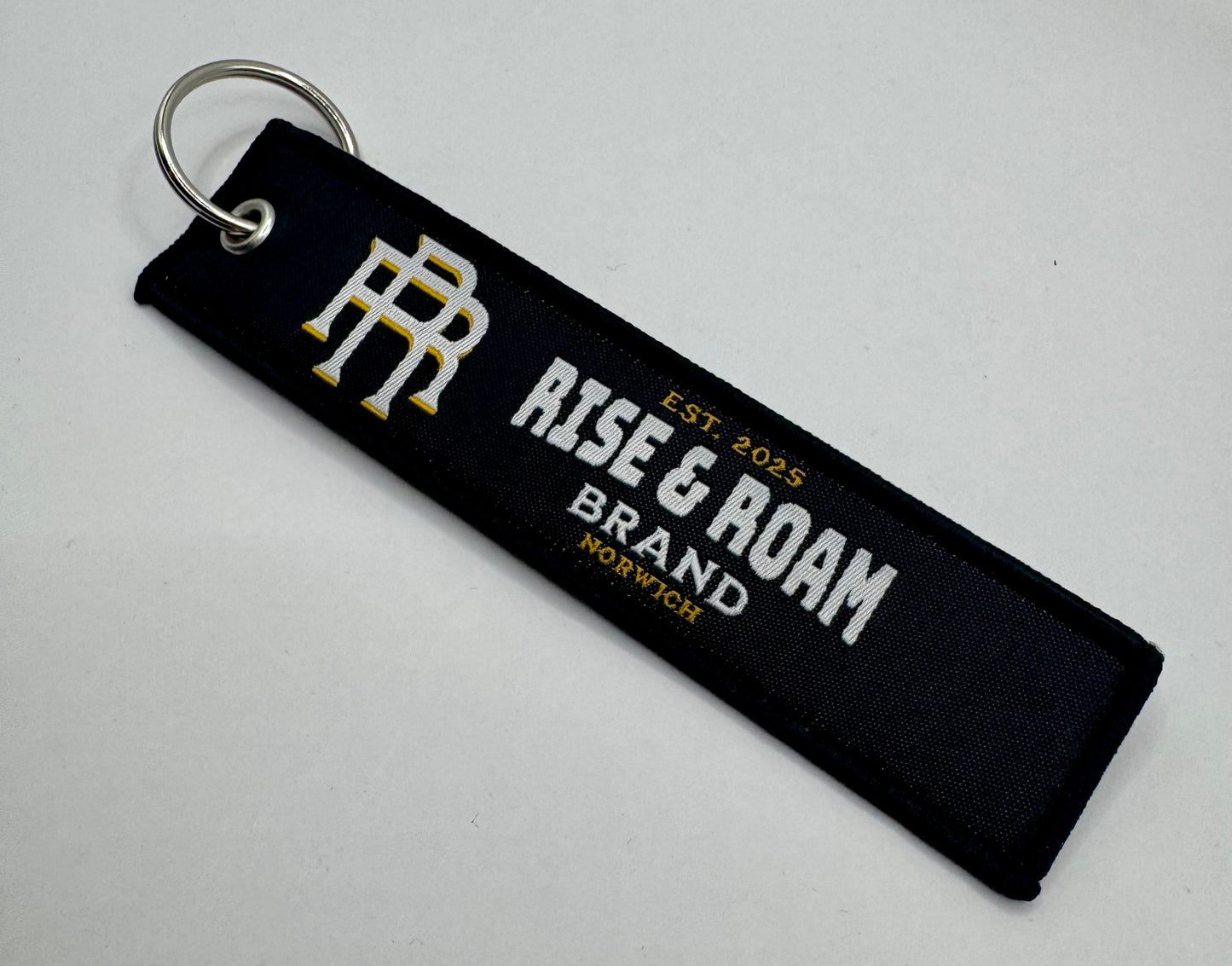 Rise & Roam Brand - Remove Before Flight Keyring.