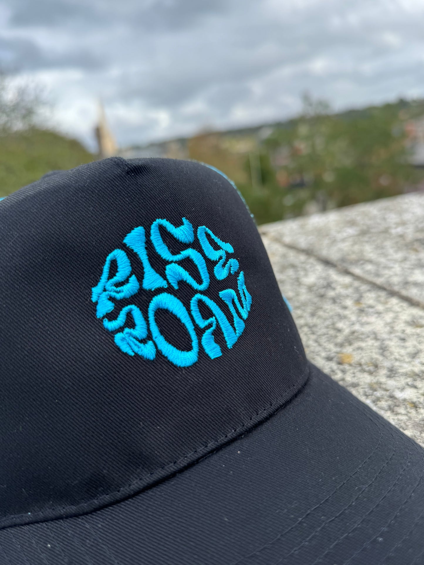 Rise & Roam Brand - Vibrant Blue Squiggle Trucker Cap.
