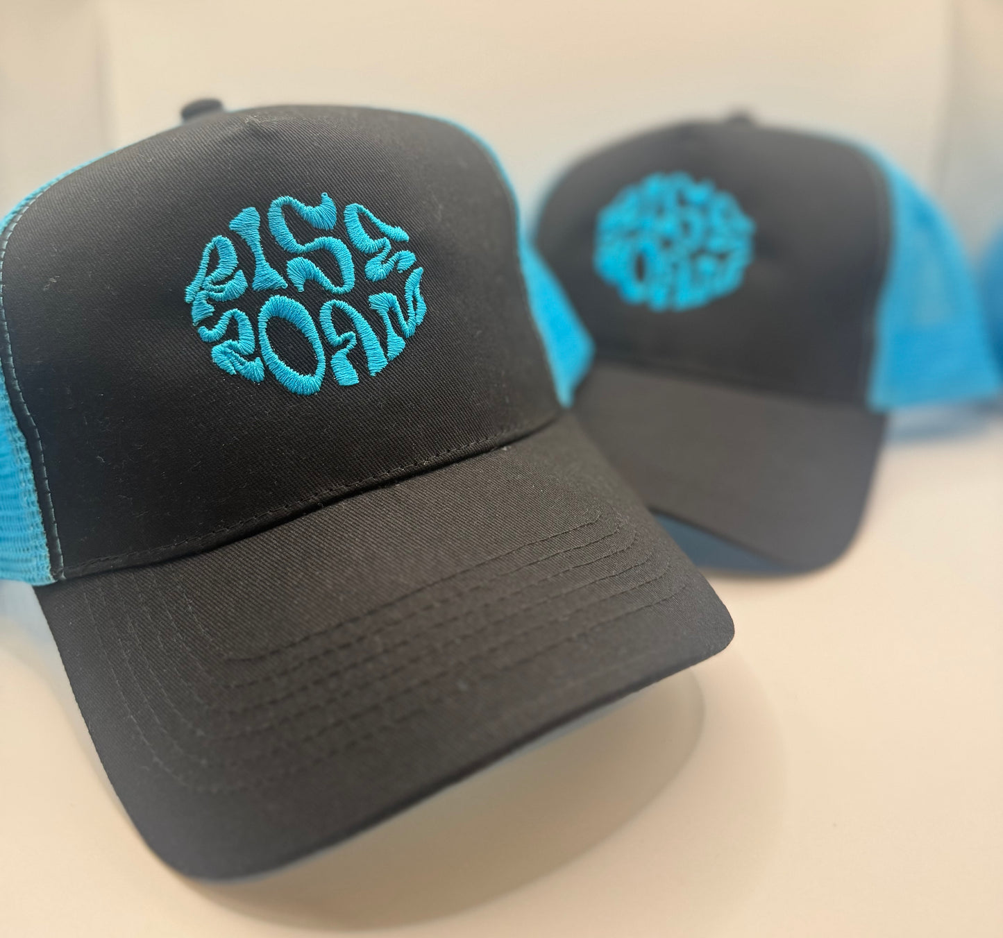 Rise & Roam Brand - Vibrant Blue Squiggle Trucker Cap.