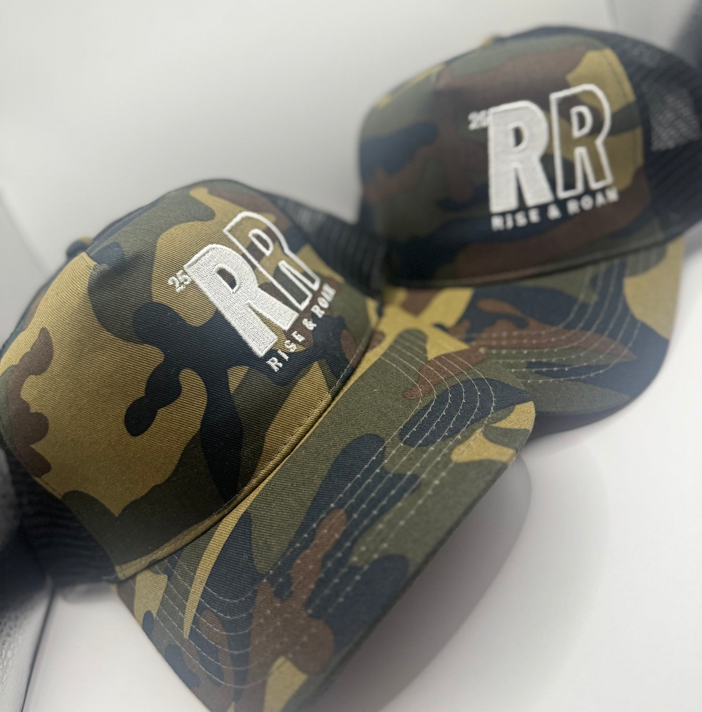 Rise & Roam Brand - Bold RR Logo Camo Trucker Cap.