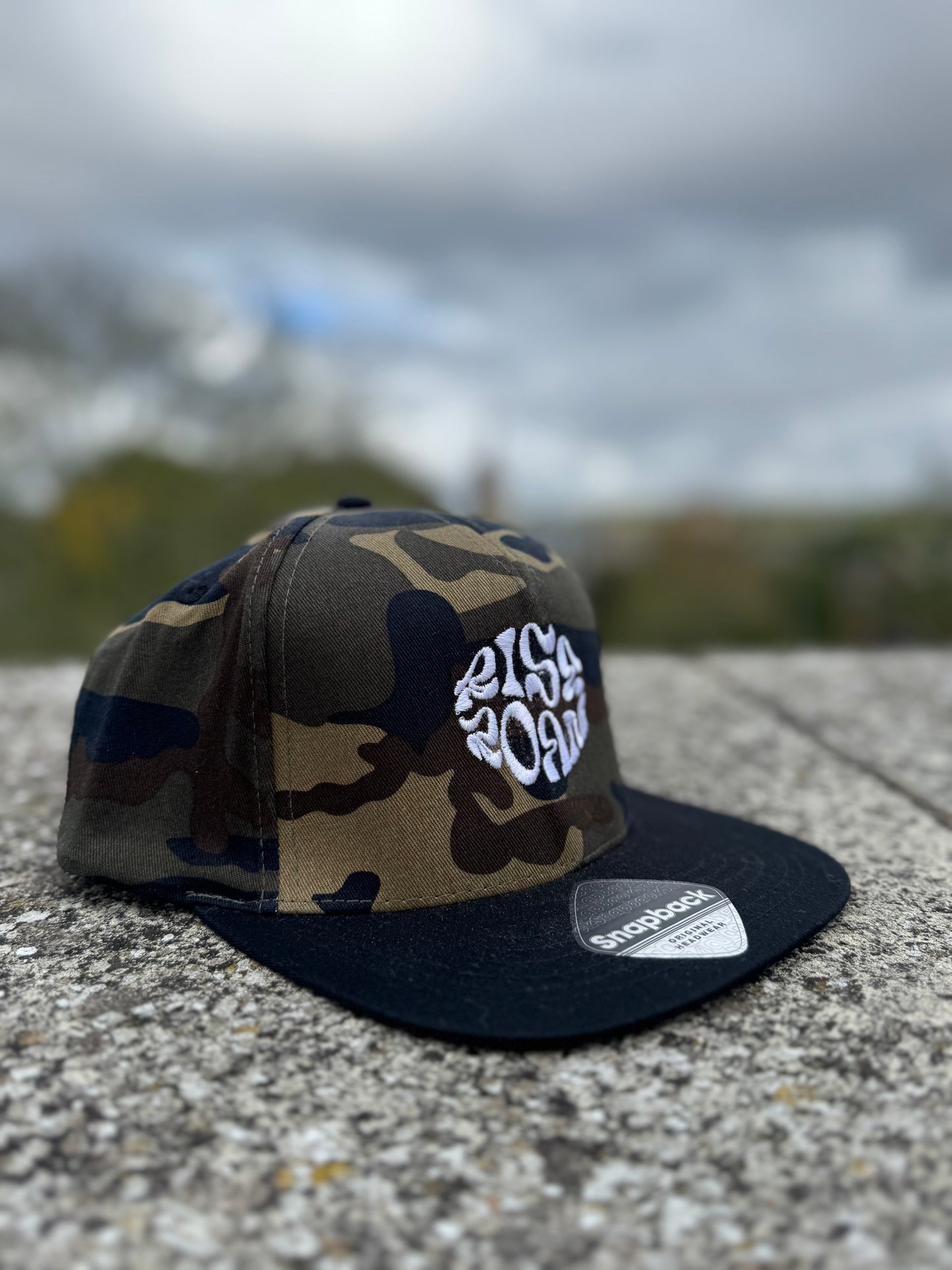 Rise & Roam Brand - Camo Squiggle SnapBack Cap.