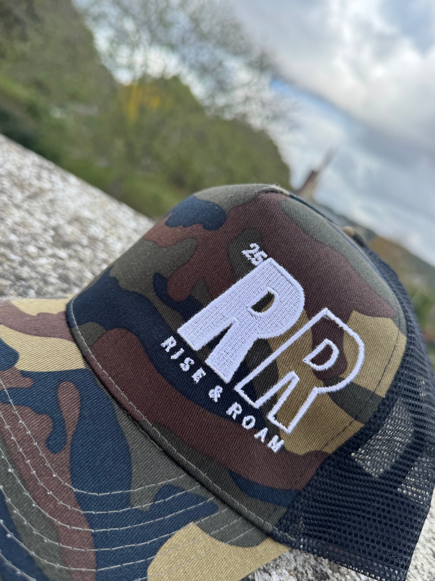 Rise & Roam Brand - Bold RR Logo Camo Trucker Cap.