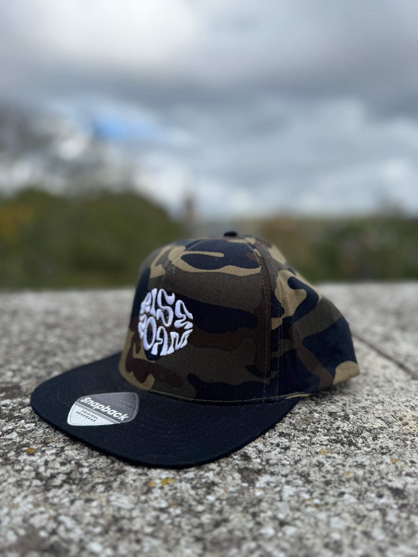 Rise & Roam Brand - Camo Squiggle SnapBack Cap.