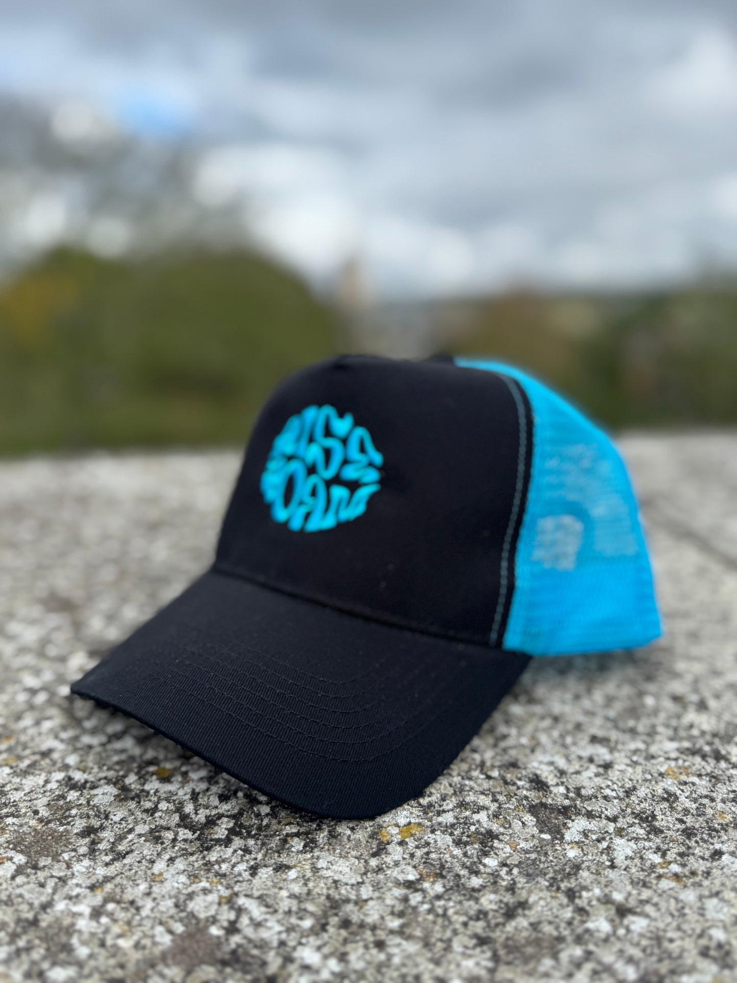 Rise & Roam Brand - Vibrant Blue Squiggle Trucker Cap.