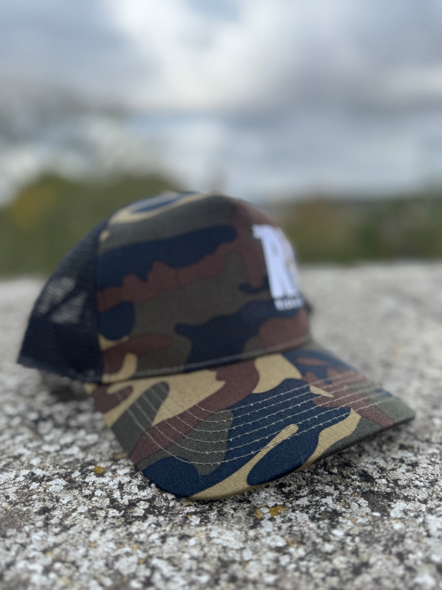 Rise & Roam Brand - Bold RR Logo Camo Trucker Cap.
